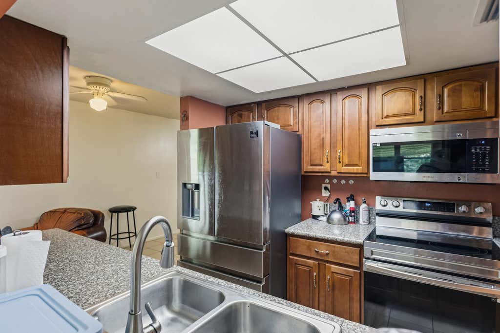 Photo of 4818 NW 58TH Street, Tamarac, FL 33319 (MLS # B26067831)