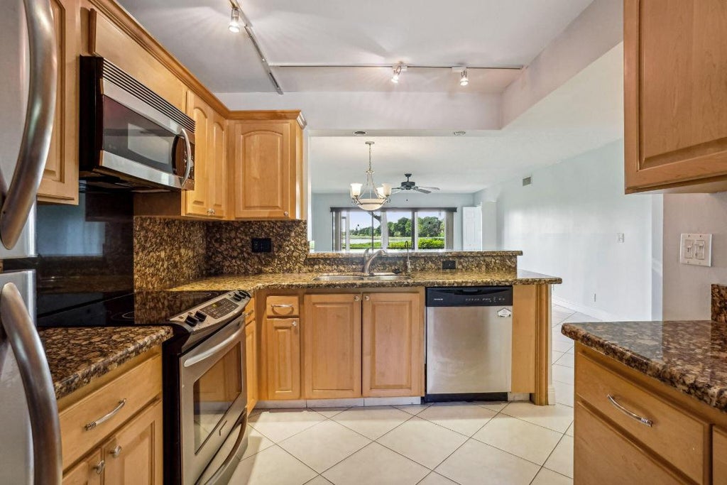 Photo of 2900 SW 22nd Circle #221f, Delray Beach, FL 33445 (MLS # R11027910)
