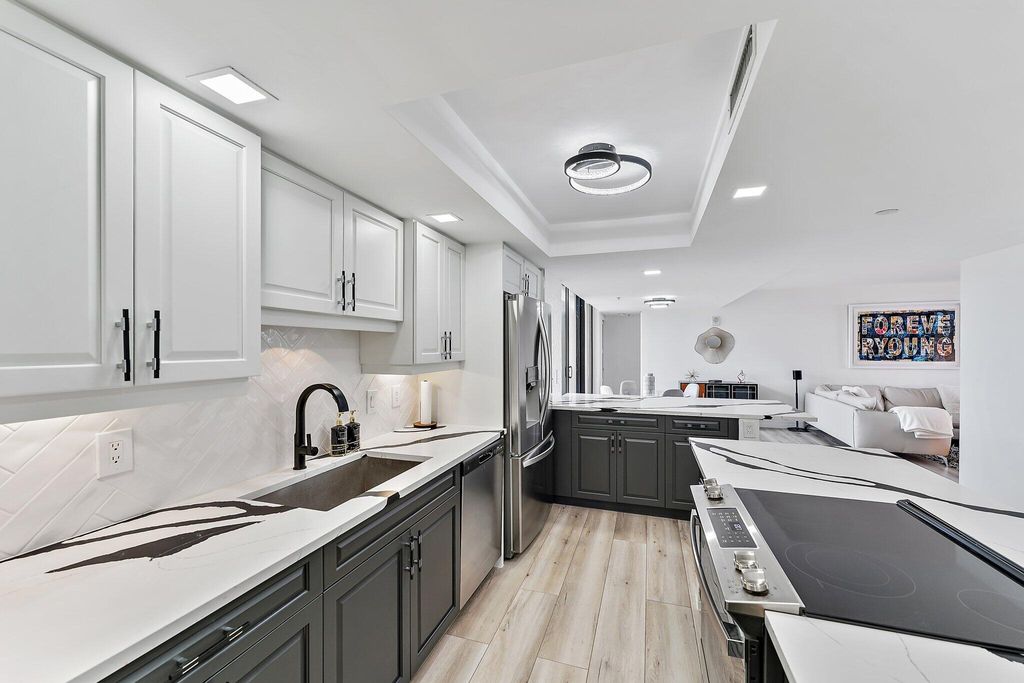 Photo of 3000 N Ocean Drive #14-A, Singer Island, FL 33404 (MLS # R11008439)