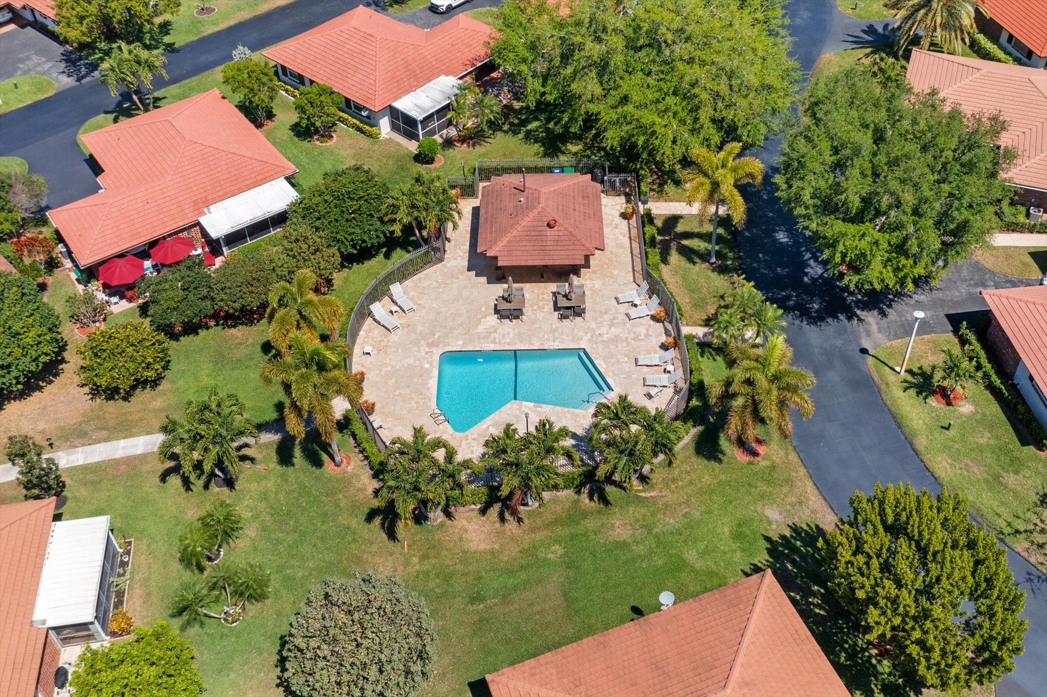 Welcome to Thunderbird! A vibrant and thriving 55+ community with only 32 single family homes located in the heart of Coral Springs! Experience the perfect blend of comfort, convenience, & community in this charming 2 bedroom, 2 bathroom single family home that offers private covered parking, laundry room, & storage closet. Located in the heart of Coral Springs, you'll have easy access to a variety of shopping, dining, & entertainment options. Explore the vibrant community, visit local parks & recreational areas, or participate in the numerous cultural & social events. Freshly painted walls. New A/C installed 10/2023! Washer & dryer less than a year old! Indulge in the community's ambiance, with a recently renovated heated POOL and BBQ area for relaxation. LOW HOA! Pets allowed!