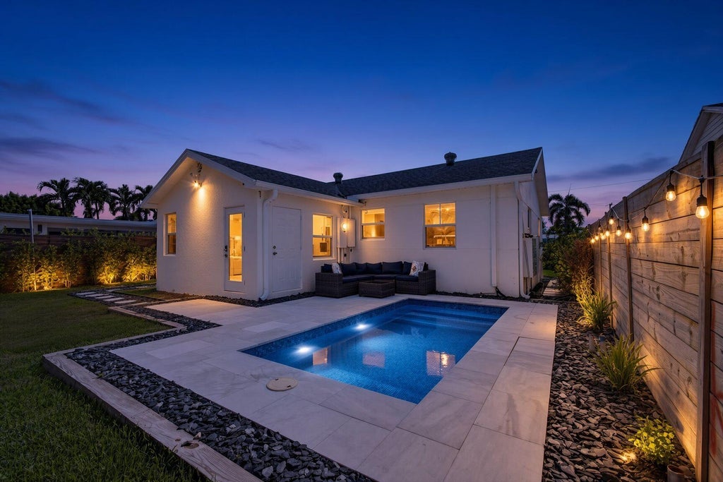 Photo of 1309 N PALMWAY, Lake Worth Beach, FL 33460 (MLS # B26064836)