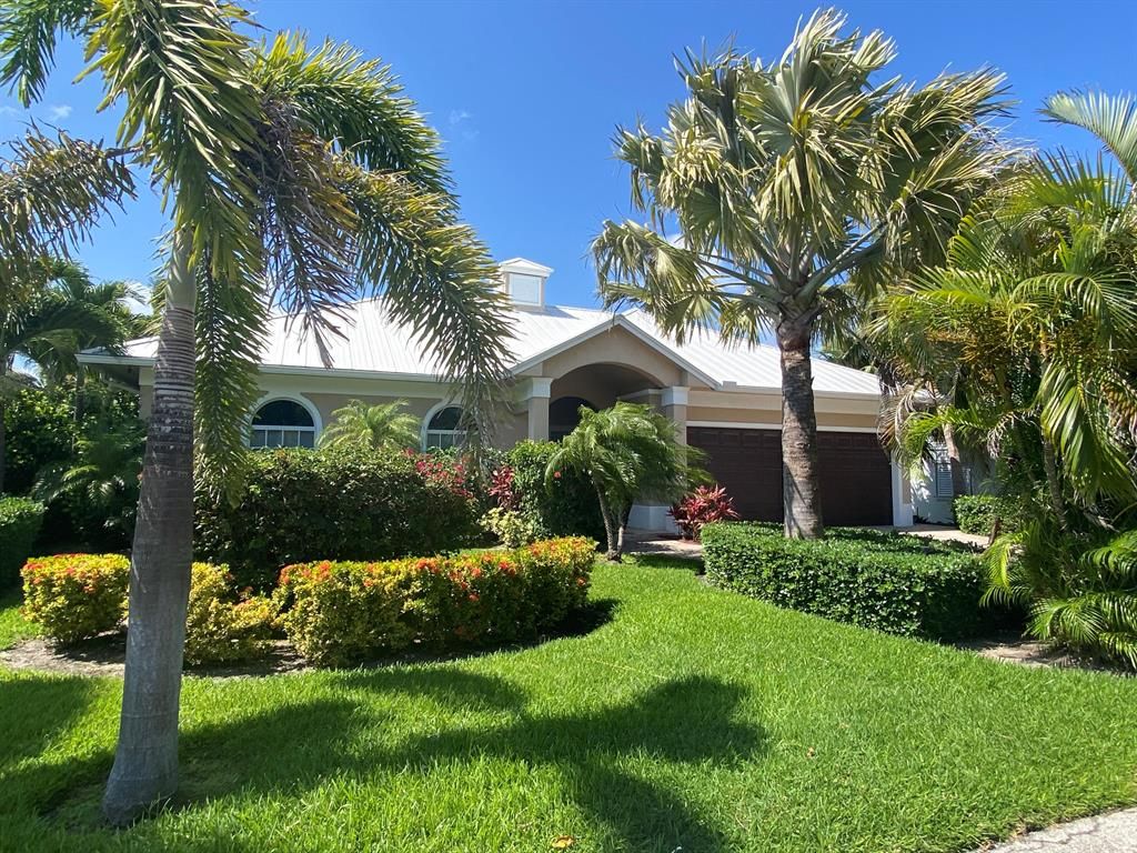 Photo of 218 Sandal Lane, Palm Beach Shores, FL 33404 (MLS # R10718164)