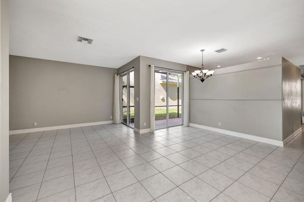 Photo of 5861 NW 122nd Way, Coral Springs, FL 33076 (MLS # F10463183)