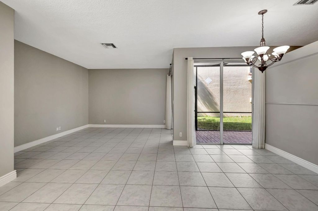 Photo of 5861 NW 122nd Way, Coral Springs, FL 33076 (MLS # F10463183)