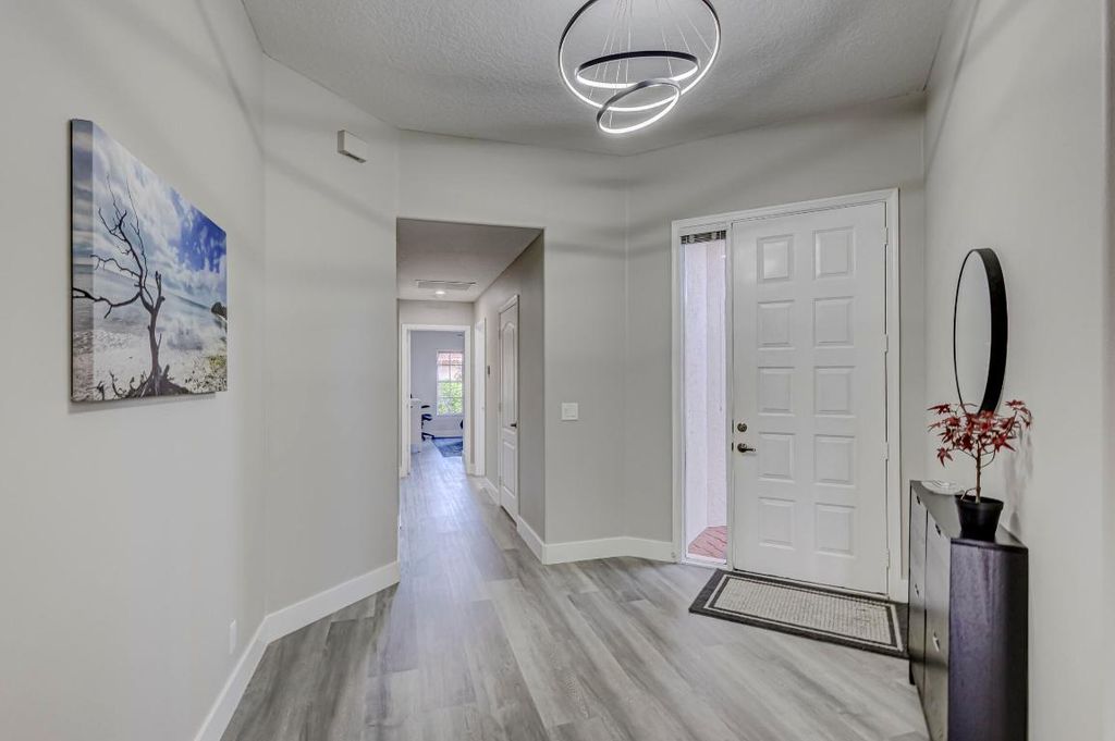 Photo of 928 Augusta Pointe Drive, Palm Beach Gardens, FL 33418 (MLS # R10940030)