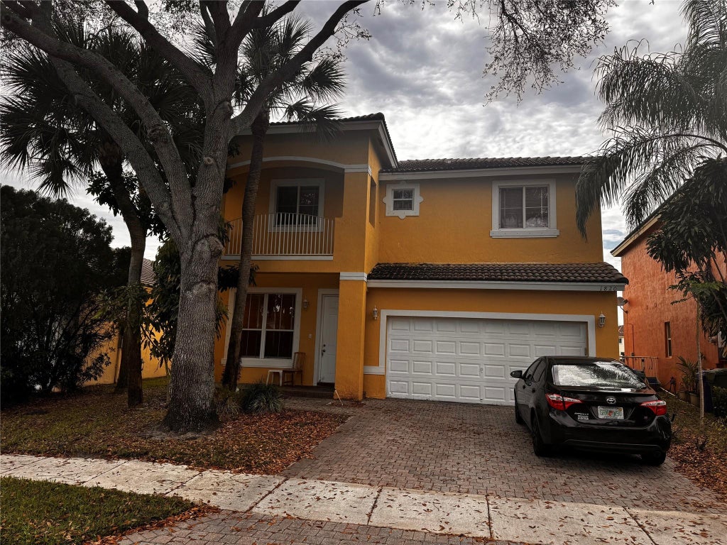 Photo of 1820 NW 78th Avenue, Pembroke Pines, FL 33024 (MLS # B26070461)