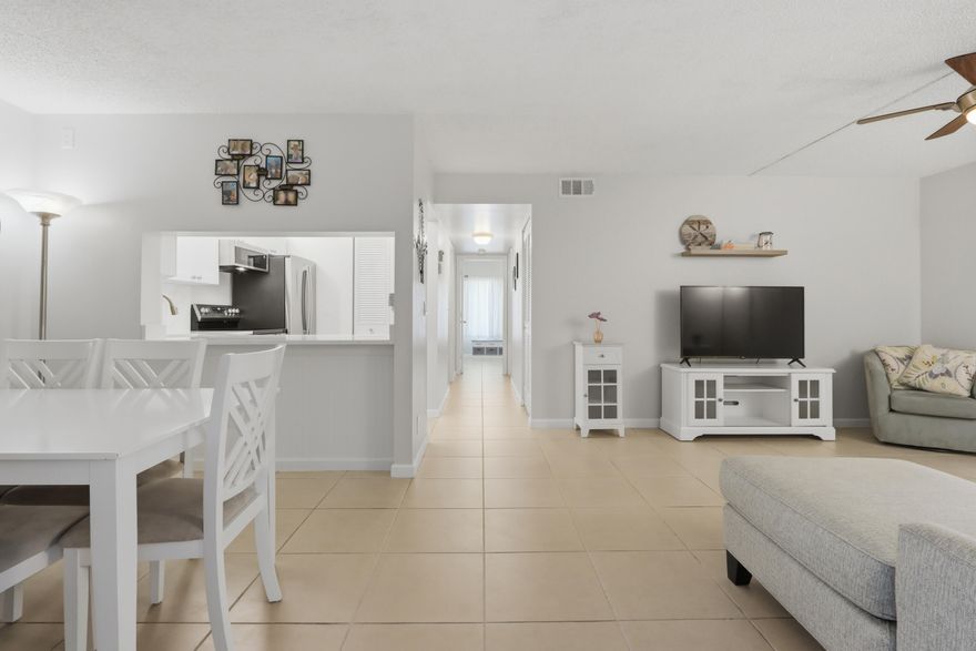 Experience effortless South Florida living in this beautifully maintained 2BD/2BTH condo located in the desirable Pine Ridge North II community in Greenacres. This first floor unit offers easy access & everyday convenience, featuring tile flooring throughout as well as an updated kitchen with modern finishes. Enjoy a light & bright layout with a relaxed coastal feel, perfect for year-round living or a seasonal retreat. Ideally situated near shopping, dining, minutes from beaches & major highways, this prime location puts everything within reach. Don't miss this move-in ready gem in a well-kept community! Book your private tour! * Furniture Negotiable*