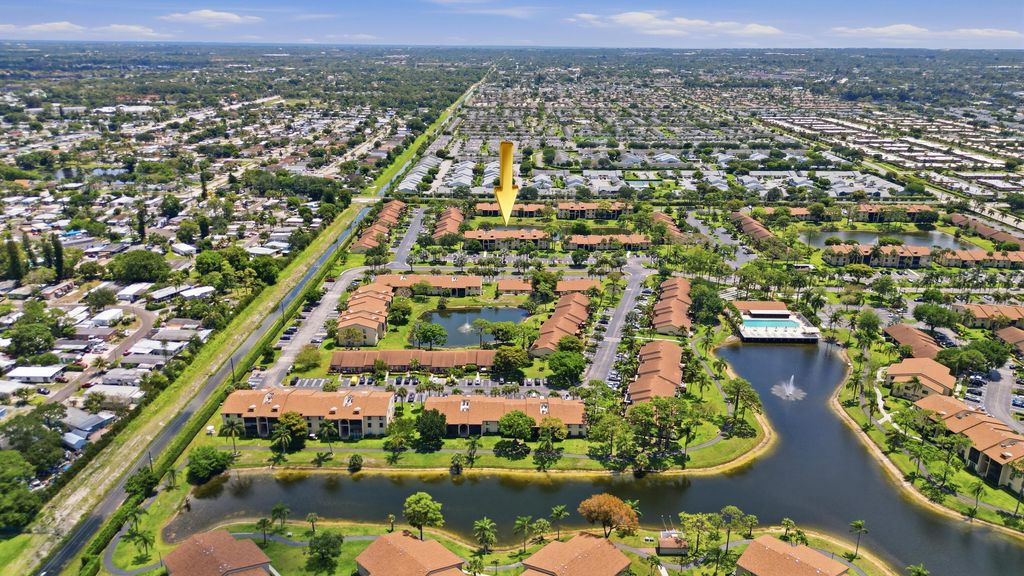 Photo of 627 Sea Pine Way #D1, Greenacres, FL 33415 (MLS # B26024254)
