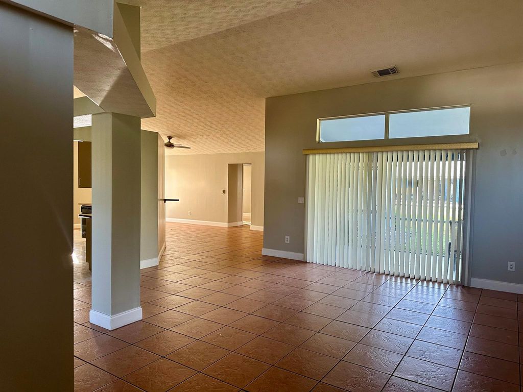 Photo of 842 SE Carnival Avenue, Port Saint Lucie, FL 34983 (MLS # R11031361)