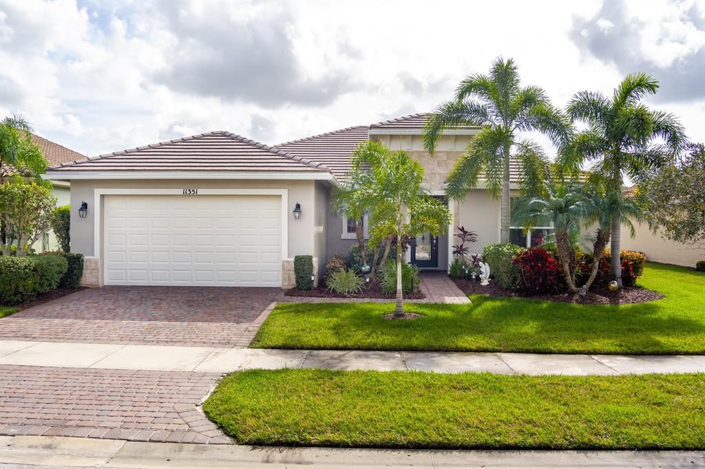 Photo of 11351 SW Aspen Lane, Port St Lucie, FL 34987 (MLS # R10848272)