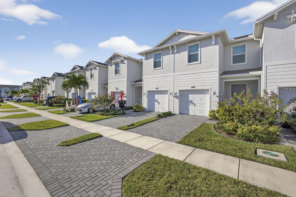 Photo of 846 SE Grovebush Lane, Port Saint Lucie, FL 34984 (MLS # R11149576)