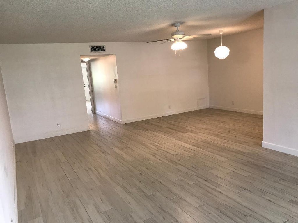 Photo of 1387 HIGH POINT Way NW #B, Delray Beach, FL 33445 (MLS # B26072845)