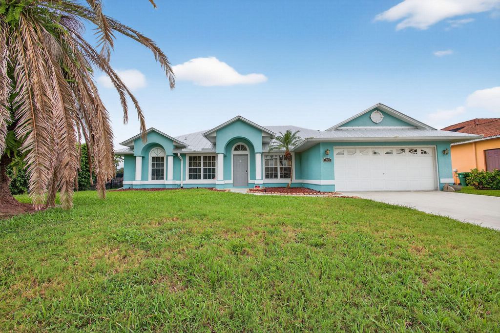 Photo of 865 SW Abingdon Avenue, Port Saint Lucie, FL 34953 (MLS # R11121725)