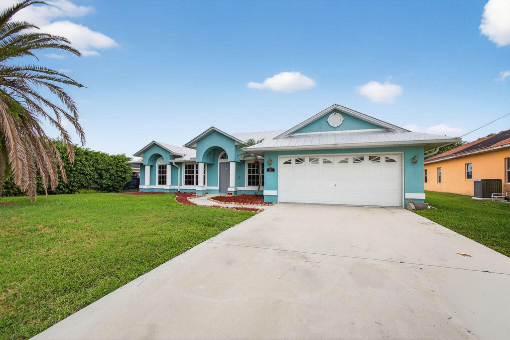 Photo of 865 SW Abingdon Avenue, Port Saint Lucie, FL 34953 (MLS # R11121725)