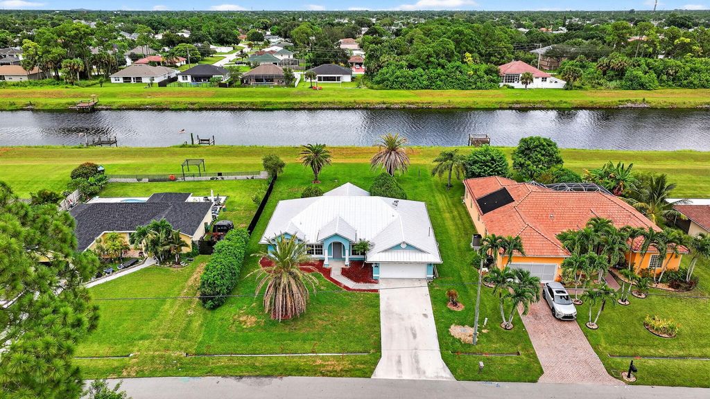 Photo of 865 SW Abingdon Avenue, Port Saint Lucie, FL 34953 (MLS # R11121725)