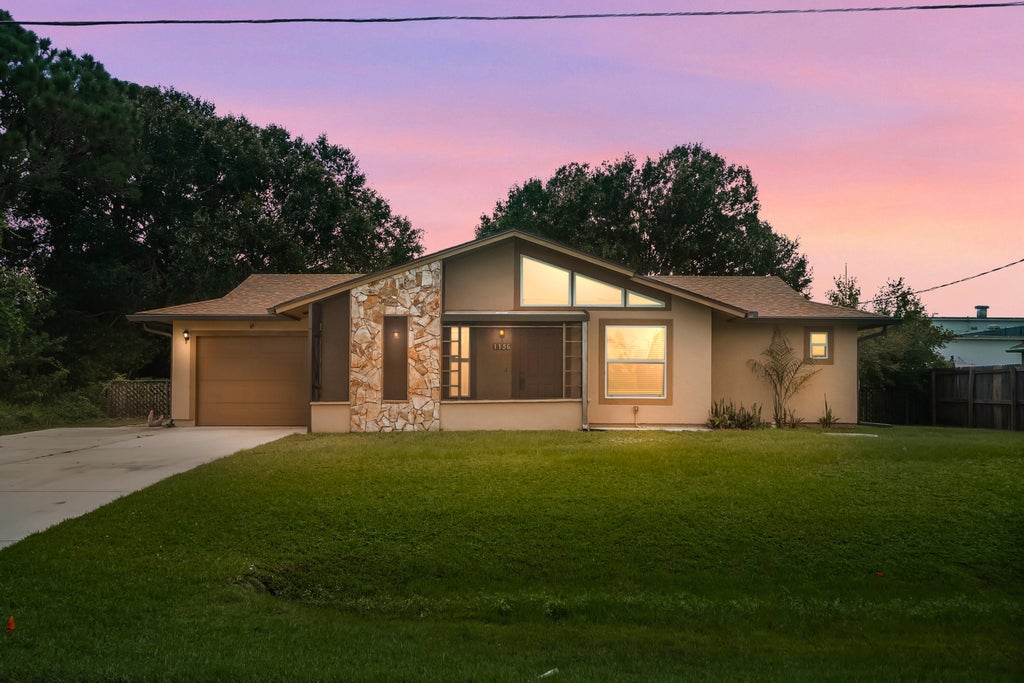 Photo of 1156 SW COLEMAN Avenue, Port Saint Lucie, FL 34953 (MLS # B26075277)