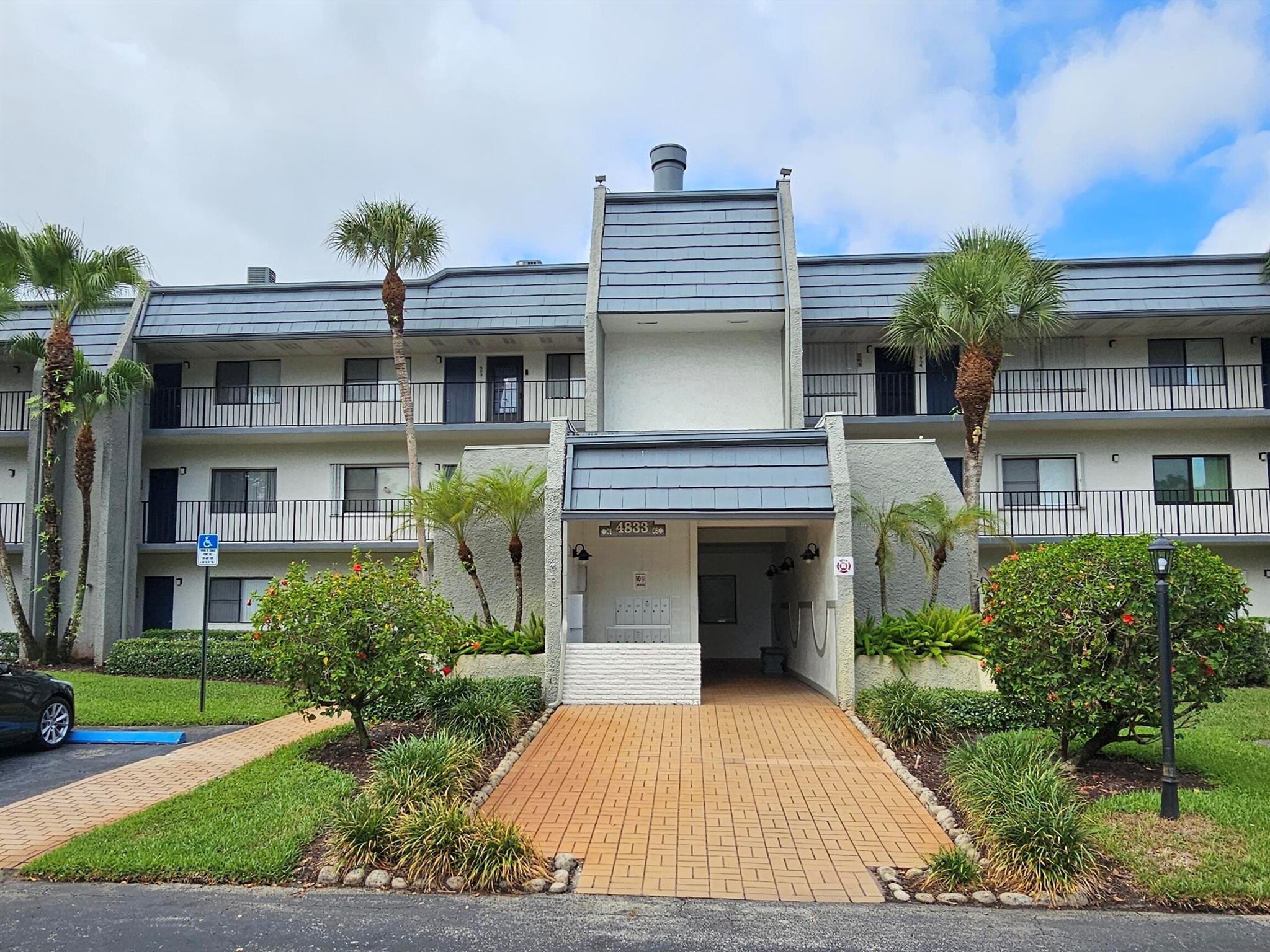 Come see this spacious, nearly 1,400 square foot corner unit in the HOPA section of The Fountains of Palm Beach. This layout is perfect for entertaining! As you enter you will notice the updated stone like flooring throughout the main space. Bedrooms have have carpeting. Split bedroom floor and both bathrooms have been updated! Kitchen provides plenty of cabinetry and stone counters! Open den can be easily converted to a 3rd bedroom and the Florida Room is perfect for sipping your morning coffee or reading a book. The primary bedroom has a large walk-in closet and the community pool is just behind the unit! The Fountains is a gated community with many available amenities. This great Fannie Mae HomePath property won't last.