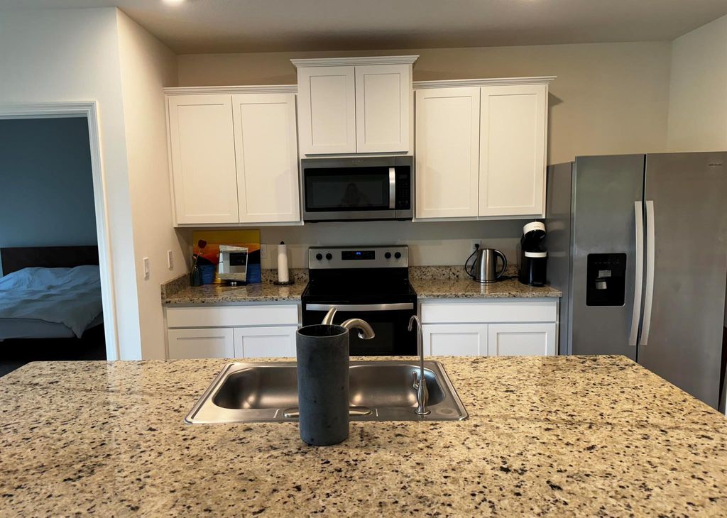 Photo of 6020 NW Regent Street, Port Saint Lucie, FL 34983 (MLS # R11057819)