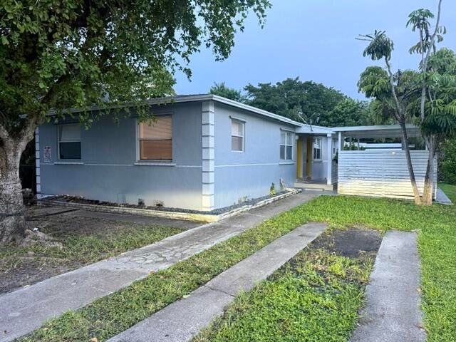 Photo of 703 N 5TH Street #1, Lantana, FL 33462 (MLS # B26074347)