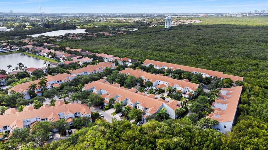RARE 2 BEDROOM 2.5 BATHROOM TOWNHOUSE WITH A SINGLE CAR GARAGE LOCATED ON A VERY QUIET STREET IN THE COMMUNITY OF WEST LAKE VILLAGE, WHICH IS GUARD GATED 24/7 AND LOCATED JUST 1 MILE FROM THE BEACH.  EACH BEDROOM IS VERY LARGE AND HAS THEIR OWN FULL BATHROOMS.  PRIMARY BEDROOM OFFERS A HUGE WALK IN CLOSET WHILE THE GUEST BEDROOM HAS A WALL TO WALL CLOSET.  LOVELY KITCHEN HAS A BREAKFAST AREA AND A PASS THROUGH TO THE FORMAL DINING ROOM, WHICH IS OPENS UP TO THE LIVING ROOM AREA.  YOU CAN WALK OUT TO THE PRIVATE COURTYARD FROM BOTH THE KITCHEN AND LIVING ROOMS, WHERE YOU CAN BBQ, ENTERTAIN, OR JUST RELAX AND READ A BOOK.  AMENTITIES INCLUDE 4 TENNIS COURTS, LARGE HEATED POOL WITH JACUZZI, FITNESS CENTER, BASKETBALL, PICKLEBALL, KIDS PLAY AREA, AND DOG PARK.