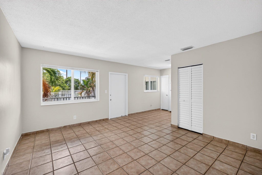 Photo of 1007 W PROSPECT RD #205, Fort Lauderdale, FL 33309 (MLS # B26073013)