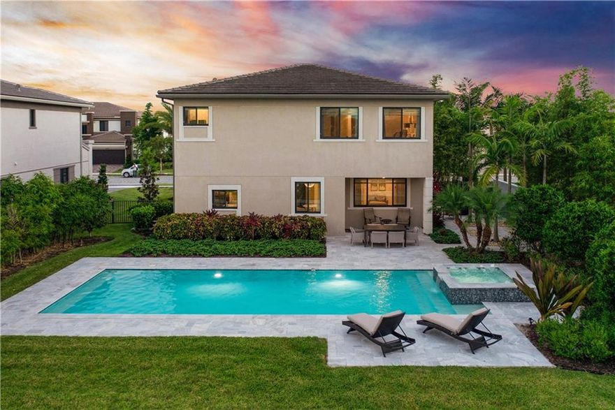 Resort Style Amenities In Your Backyard w/The Bells & Whistles. Enjoy Laps In Your 40ft Long Pool & Massive Yard Overlooking Your Waterview On Your 14,000 SqFt Lot. Spend Quiet Nights In Your Tropical Oasis Listening To Your Mosaic Fountains & Luxurious Landscaping & Lighting. Former Builder Model Professionally Designed 4br/4ba w/Quartz Kitchen, Private Balcony, Covered Patio, & Impact Windows/Doors. Enjoy A Beautiful Chef's Kitchen & SS Appliances w/A Gas Range. Double Doors Lead To The Main Suite, Dual Vanities, Soaking Tub & Massive Frameless Shower. This Home Is Perfect For Hosts Who Love To Entertain. Luxurious Resort-Style Guard-Gated Community. Access to Miralago & Cascata Clubhouses w/A Fitness Center, Splash Parks, Tennis/Basketball Courts & Swimming Pools. A-Rated Schools.