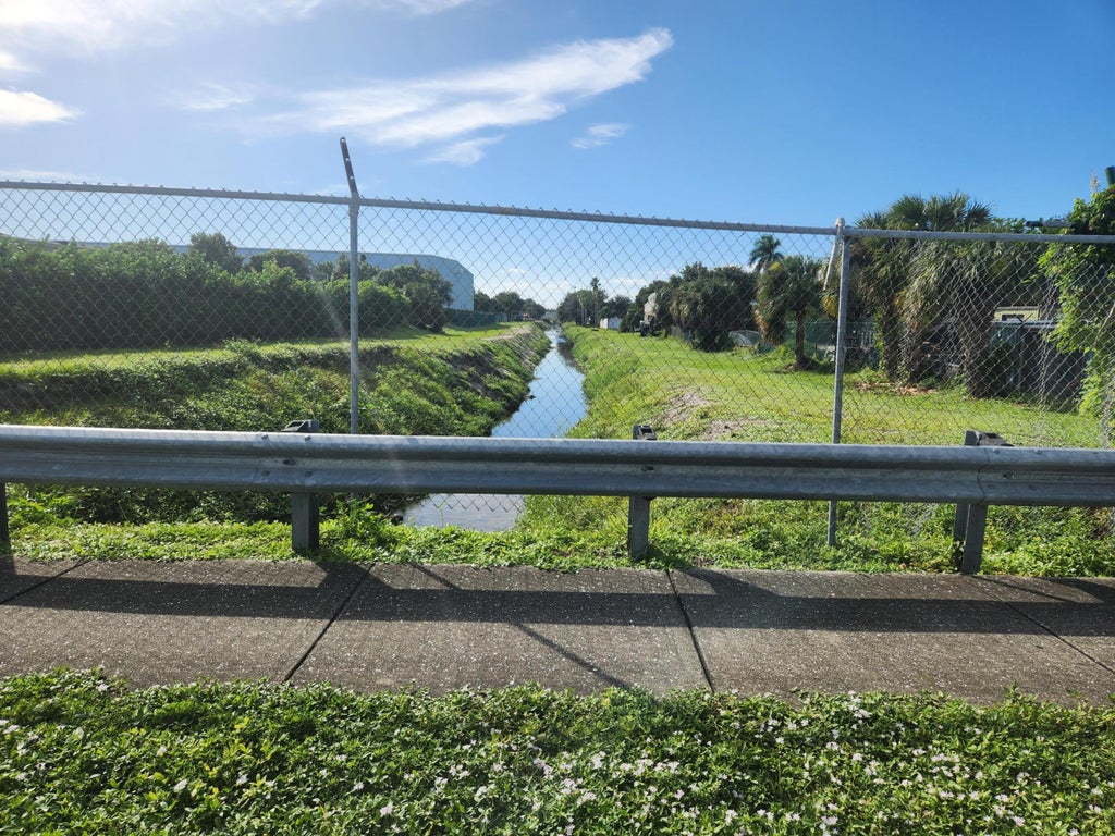 Photo of 1688 W 10th Street, Riviera Beach, FL 33404 (MLS # B26091327)
