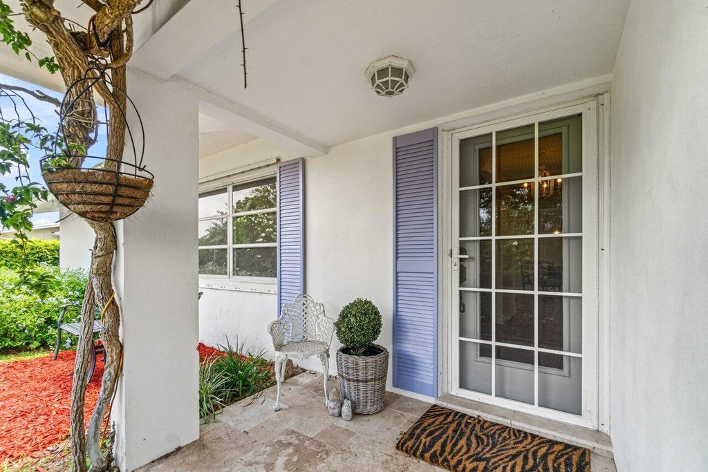 Photo of 9917 N Fushia Circle, Palm Beach Gardens, FL 33410 (MLS # R11008889)