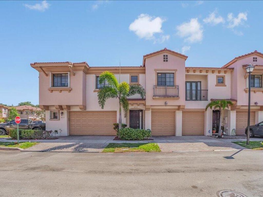 Photo of 4712 Grand Cypress Circle N, Coconut Creek, FL 33073 (MLS # B26030683)