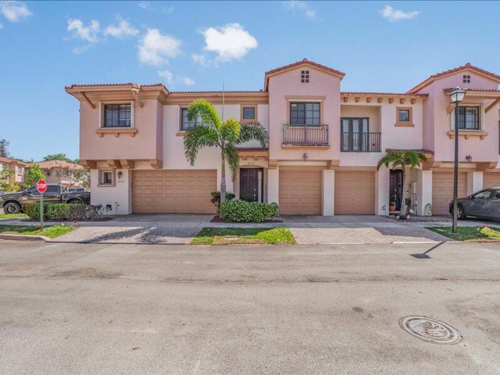 Photo of 4712 Grand Cypress Circle N, Coconut Creek, FL 33073 (MLS # B26030683)