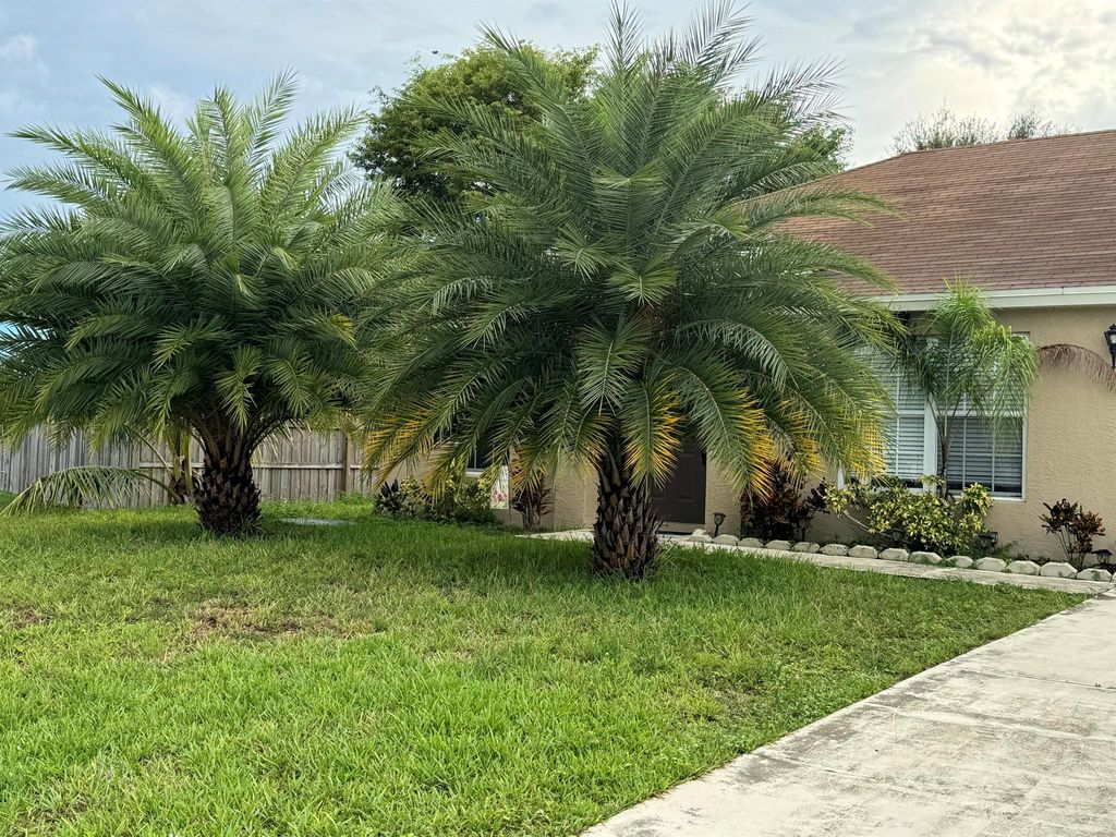 Photo of 2212 SE Maize Street, Port Saint Lucie, FL 34952 (MLS # R11008394)