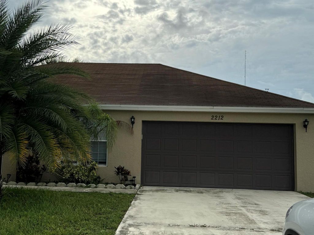 Photo of 2212 SE Maize Street, Port Saint Lucie, FL 34952 (MLS # R11008394)