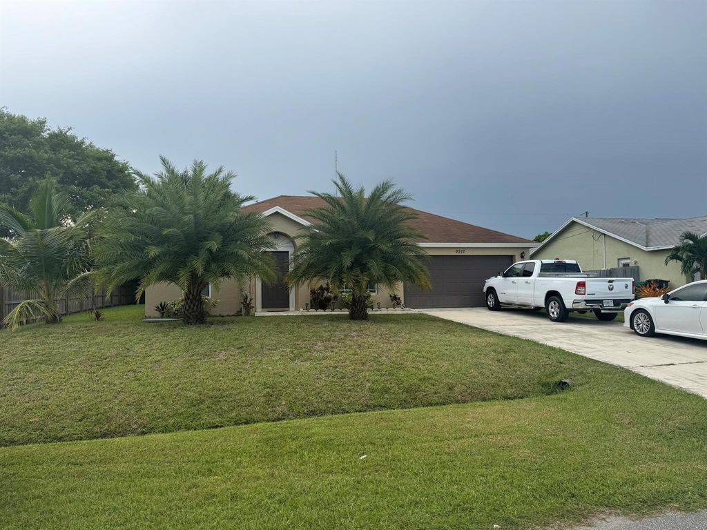 Photo of 2212 SE Maize Street, Port Saint Lucie, FL 34952 (MLS # R11008394)
