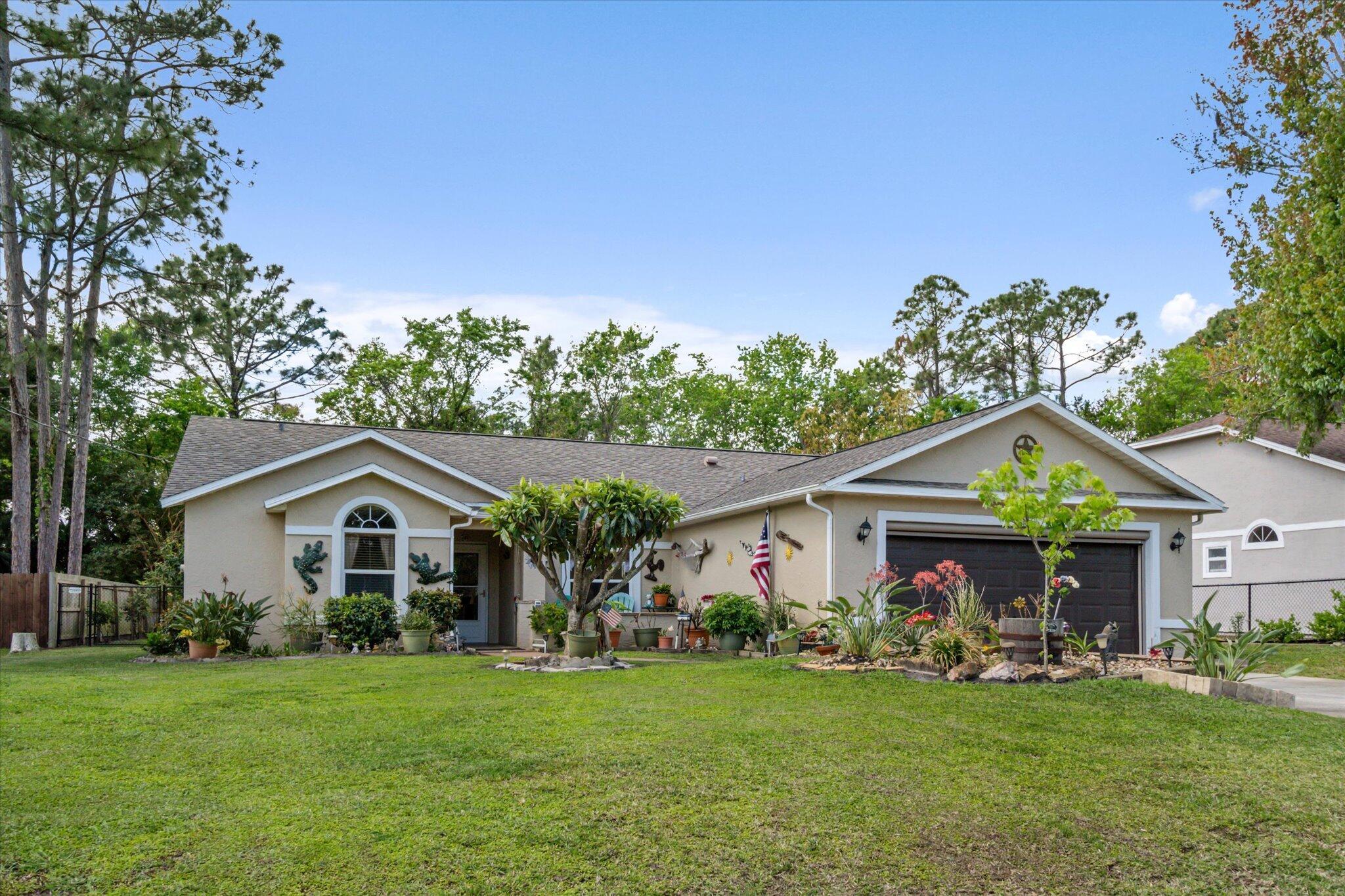 Spacious 3-bed, 2-bath home with 1,896 sq. ft. of living space! Enjoy a Florida room, electric pull-up garage screen (2022), and granite kitchen with oak cabinets, pantry, and fire door (2021). Owner's suite offers a 10x10 walk-in closet, Jacuzzi tub, and separate tub/shower. Updates include new roof and skylight (2021), water heater and shower valve (2022), generator outlet (2024), and A/C unit (June 2025) with 10-year warranty. Vaulted ceilings add charm. Guest bath has tiled shower; garage has new LiftMaster opener, door, and cables (2022). Outside features include 10x10 gazebo, large shed, fenced yard with 2 extra gates, and a well for irrigation. High and dry! Near beaches, shops, schools, and walking trails. Don't miss this gem!