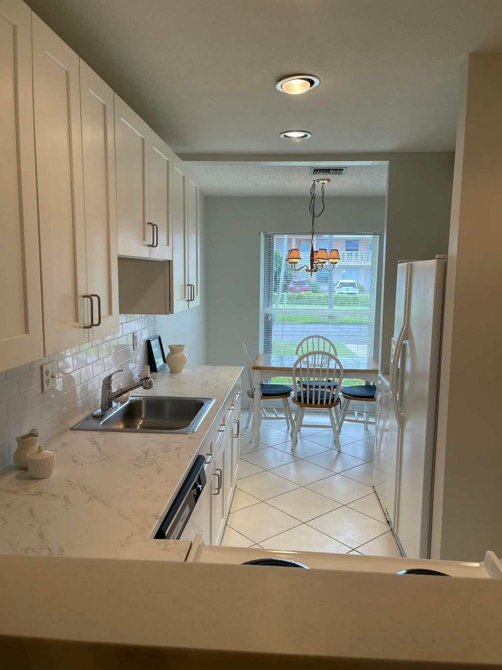 Photo of 1661 NW 20th Ave #A-1, Delray Beach, FL 33445 (MLS # R11136595)