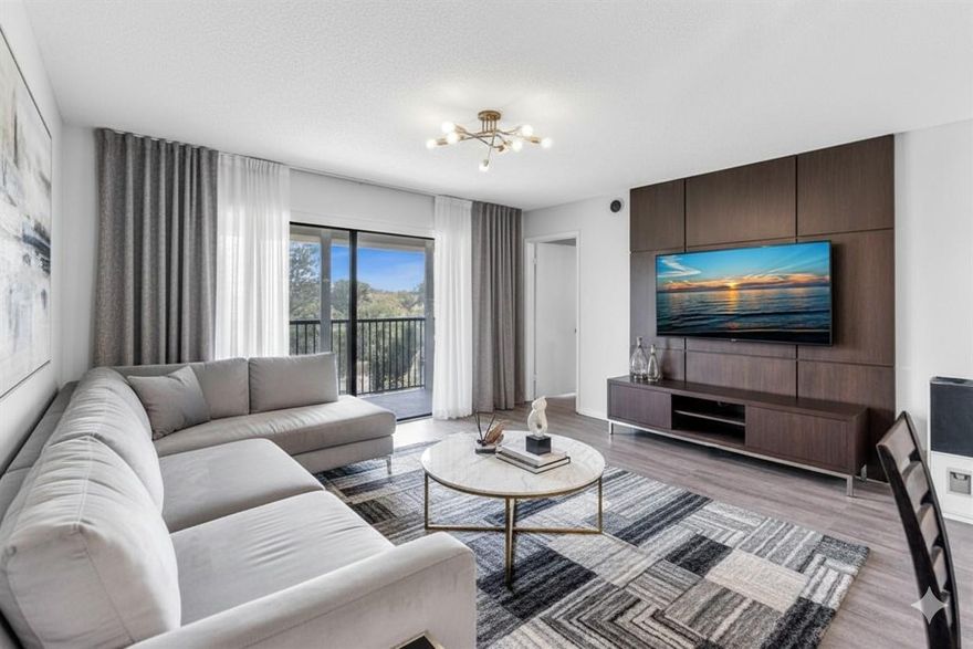 Motivated Seller! Currently, the ONLY 3br available unit is Saxon Woods! This spacious split floor plan, 3-bedroom, 2-bath condo features stainless steel appliances, vinyl flooring, and a screen in patio. Washer and Dryer in the unit!  The building has passed the 40-year inspection. The roof was replaced in 2025. Located near parks, shopping areas, and major highways. Great for owners or investors! Kitchen and living picture has been virtually modified.