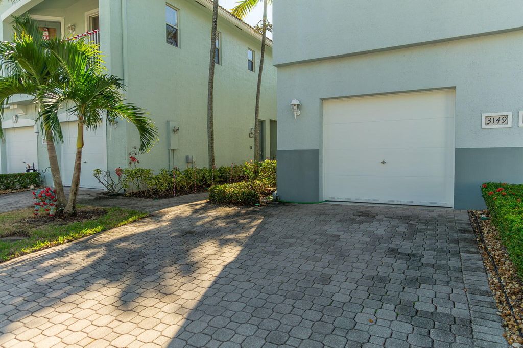 Photo of 3149 Laurel Ridge Circle, Riviera Beach, FL 33404 (MLS # B26001589)