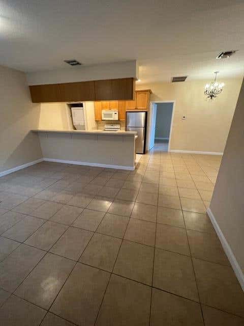 Photo of 11957 Sturbridge Lane, Wellington, FL 33414 (MLS # B26060273)