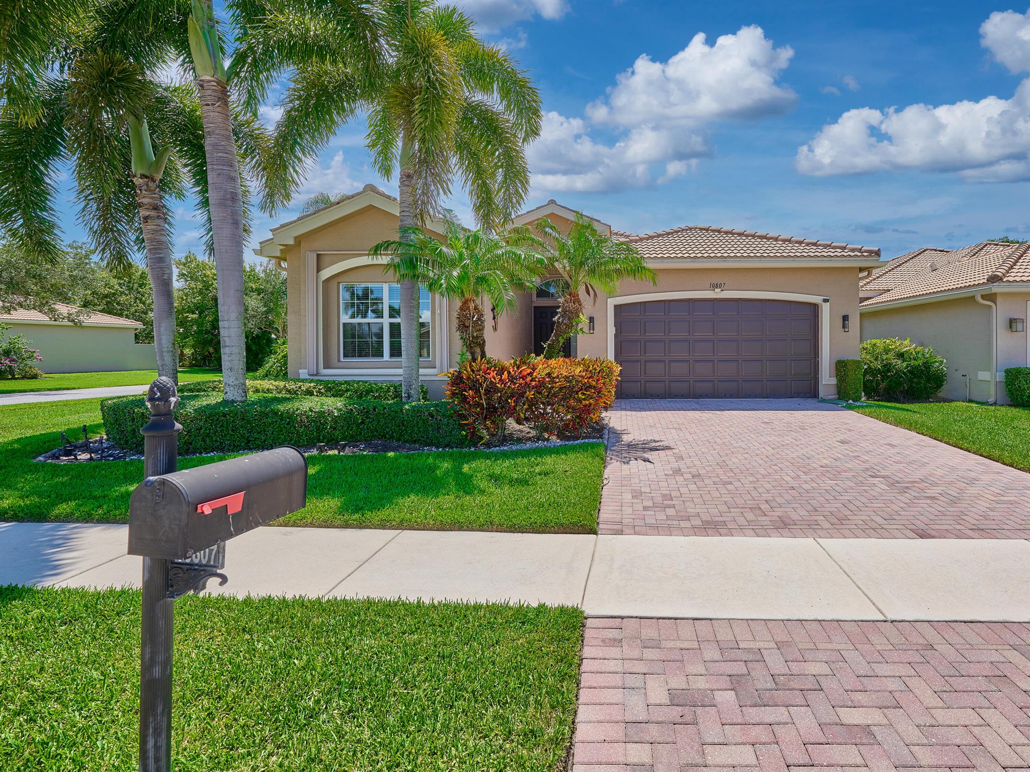 Pristine Atlantic Grand Model Just Steps from the Clubhouse!Experience effortless elegance in this beautifully maintained, light-filled corner lot home located in the heart of Valencia Reserve. This sought-after Atlantic Grand model offers easy, open-concept living with a bright and airy flow throughout.The gourmet kitchen is a standout--featuring upgraded white cabinetry, gleaming granite countertops, glass subway tile backsplash, stainless steel appliances, and convenient pull-outs for maximum functionality. The spacious great room is perfect for both entertaining and everyday comfort.Retreat to your serene primary suite with tray ceiling, generous closets, and a luxurious upgraded bath. Guests will enjoy their own on-suite bedroom for ultimate privacy.
