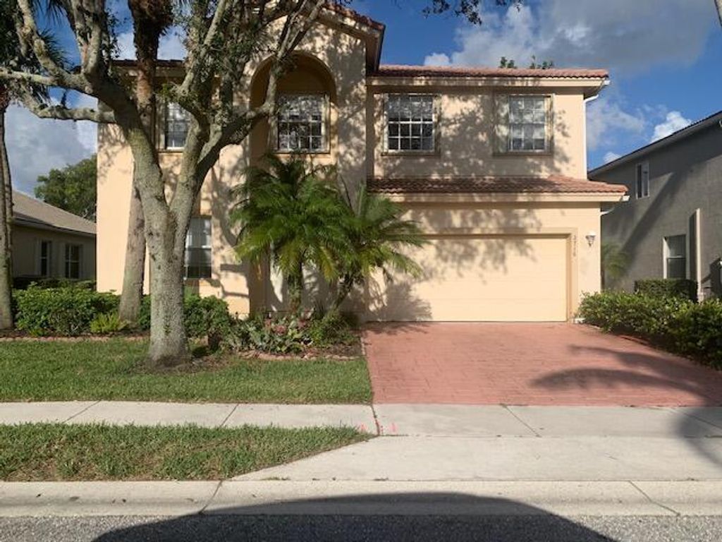 Photo of 2716 San Andros, West Palm Beach, FL 33411 (MLS # R10823473)