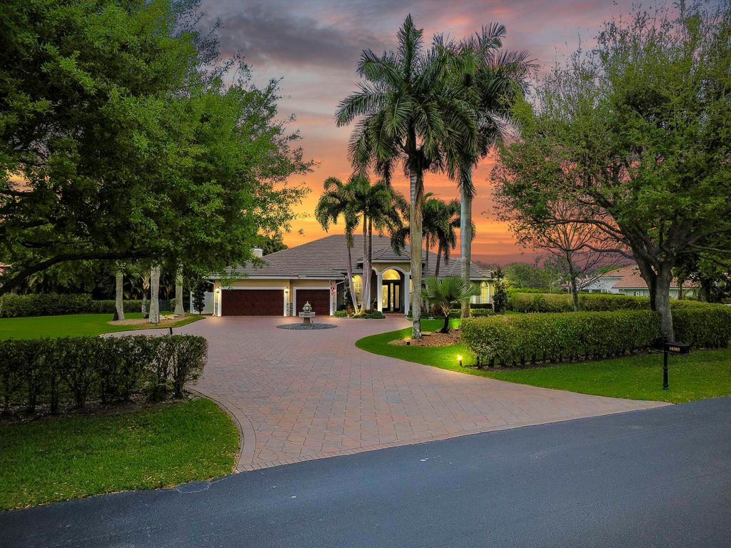 Photo of 10305 Avenida Del Rio, Delray Beach, FL 33446 (MLS # B26004489)