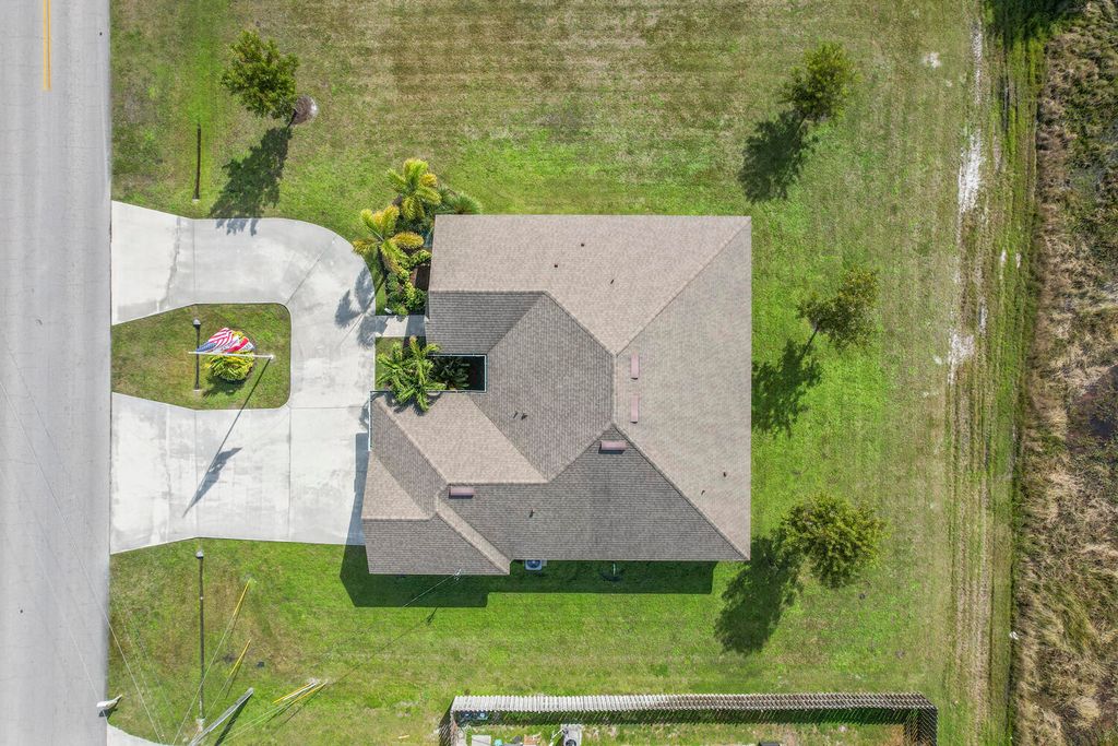 Photo of 6486 NW Volucia Drive, Port Saint Lucie, FL 34986 (MLS # R10918022)