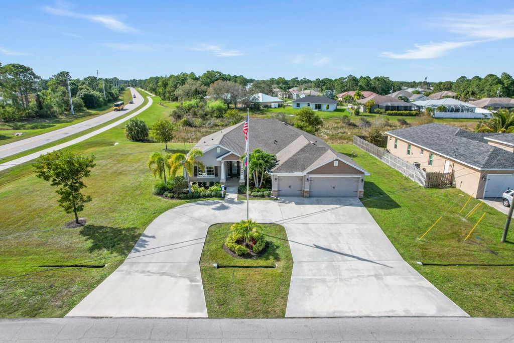 Photo of 6486 NW Volucia Drive, Port Saint Lucie, FL 34986 (MLS # R10918022)