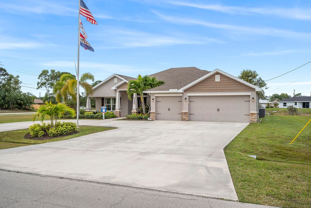 Photo of 6486 NW Volucia Drive, Port Saint Lucie, FL 34986 (MLS # R10918022)