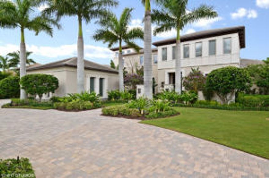 Magnificent Courchene former Model Home in Old Palm Golf Club's Grand Estates is situated on an expansive half acre lot surrounded by lush landscaping. This spectacular five bedroom Royalton model features a game room (or possible optional six bedroom), library, loft, balcony and 3.5 car garage.Additional details of this upgraded home, photos and video link are available by contacting Linda Bright. Old Palm Golf Club offers limited membership, privacy, and luxury 18 hole championship golf course designed by Raymond Floyd. The clubhouse features private dining, bar, lounge, board room, wine room, concierge services, fitness center, spa, casitas for overnight guest accommodations, and much more.