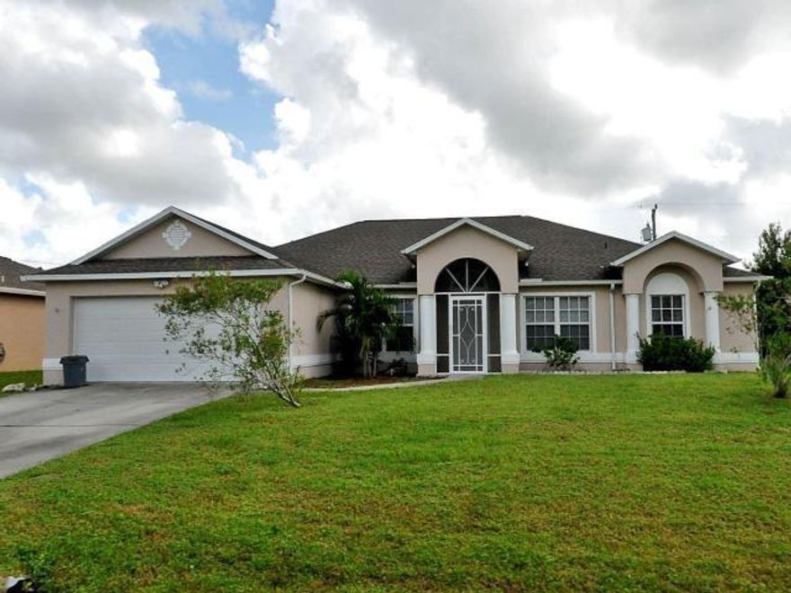Beautiful CBS home with 17 + new upgrades with extra cabinets for storage French doors lead to a beautiful Florida room with AC until and screened porch--New A/C with 10 yrs guaranty-- overlooking private fenced yard--The entire main area is wide open--they are a total 8 spaces, New Window Treatments ---You have to see it to love it