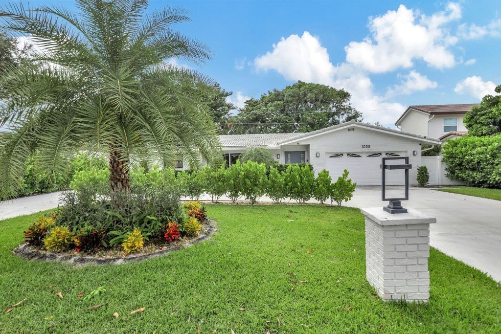 Photo of 1035 NW 5th Avenue, Boca Raton, FL 33432 (MLS # F10498992)