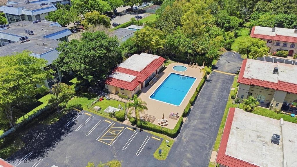 Photo of 3050 N Riverside Drive #1a, Coral Springs, FL 33065 (MLS # B26028371)