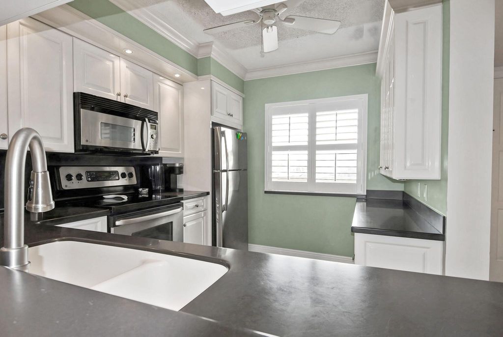 Photo of 1001 Seafarer 303 Circle #303, Jupiter, FL 33477 (MLS # R11062953)