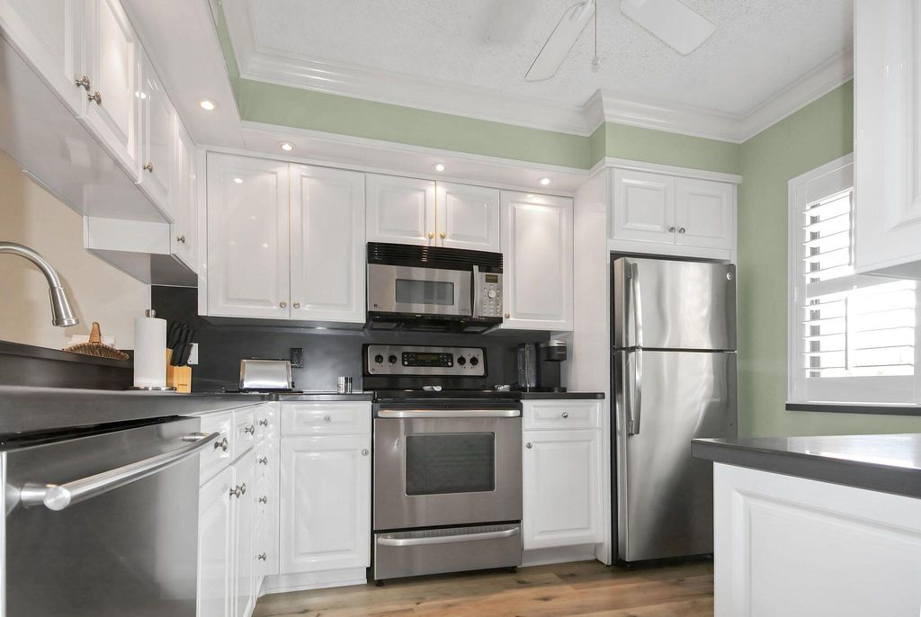 Photo of 1001 Seafarer 303 Circle #303, Jupiter, FL 33477 (MLS # R11062953)